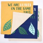 Pamut Párnahuzat Felirattal - We are Leaves - Sárga, Kék és Natúr